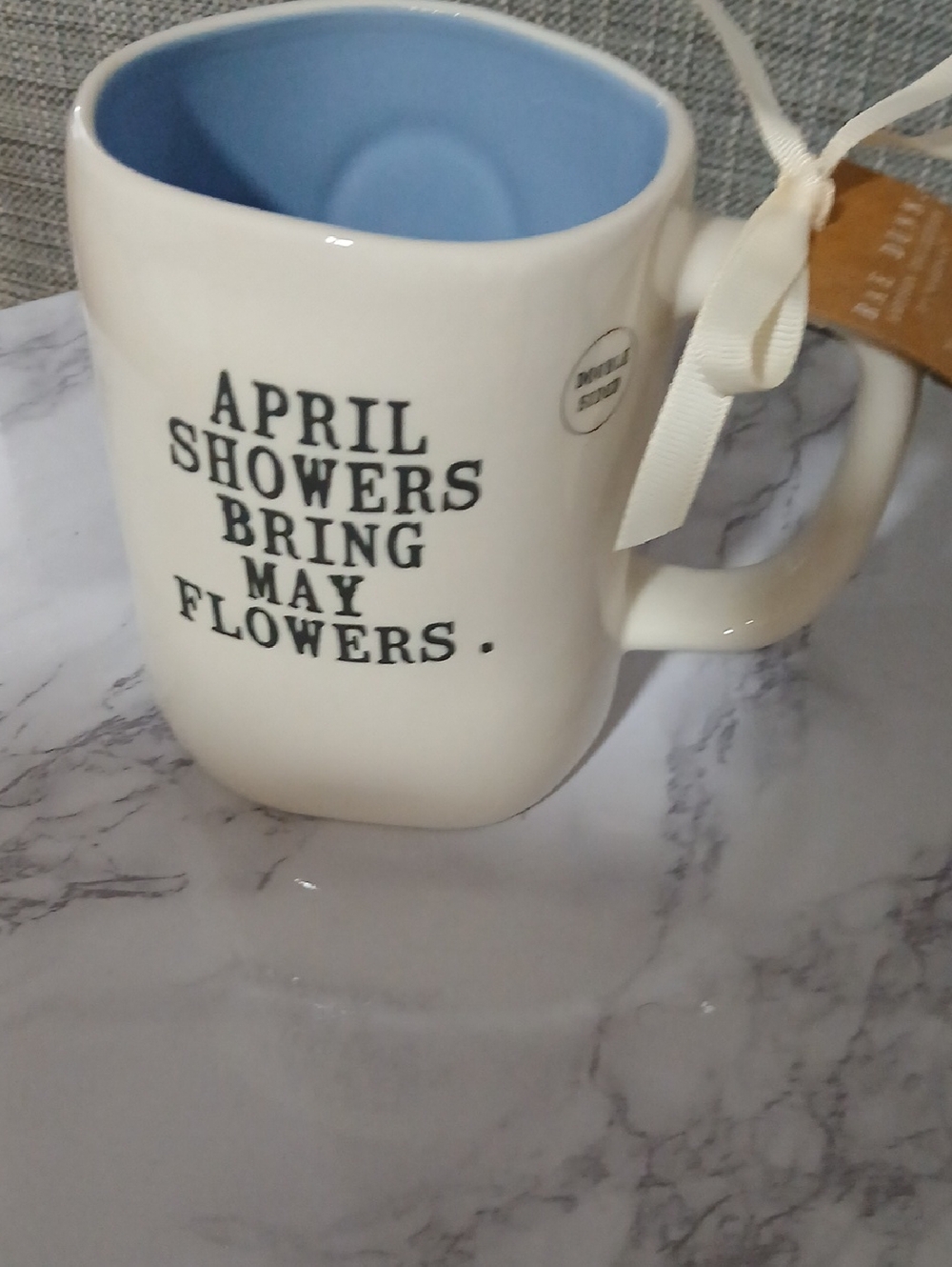 Rae Dunn Cream Mug with Blue Interior - "April Showers"